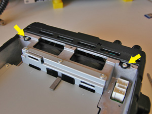 Remove the front panel assy holding screws (part 1)